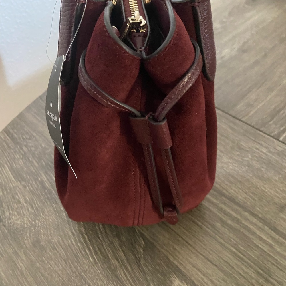 Kate Spade Dark Merlot Suede Satchel
Measurements: Length 9.88  Height 8 - Picture 8 of 12